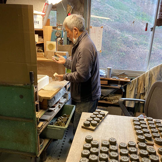 Artisan in workshop making Awaji Kawara Magnetic Needle Minder with Polisher | Brooklyn Haberdashery