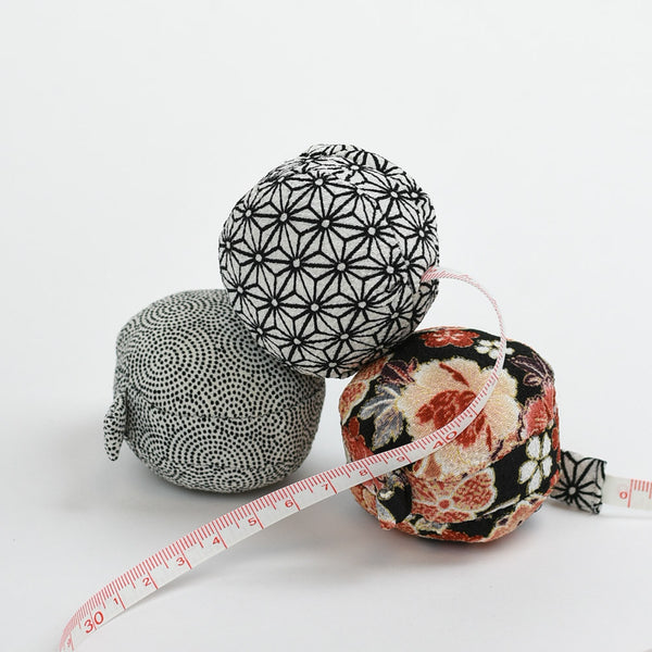 https://www.brooklynhaberdashery.com/cdn/shop/products/macaron-fabric-tape-measure-floral-asanoha-uzumasa_grande.jpg?v=1667744164